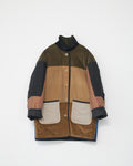 Multicolored coat with patchwork design on a white background. Front view