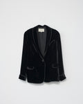 Black silk velvet blazer on a light gray background. Front view