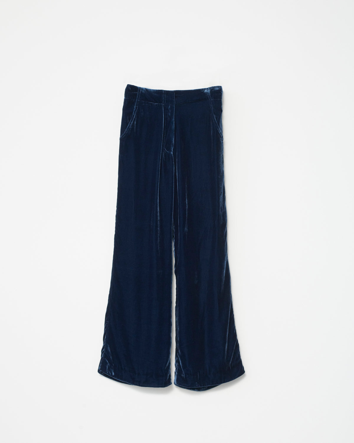 Dark blue velvet pants on a white background. Front view