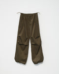 a pair of wide-leg corduroy trousers in tobacco with an adjustable elastic waistband. White background, front view.