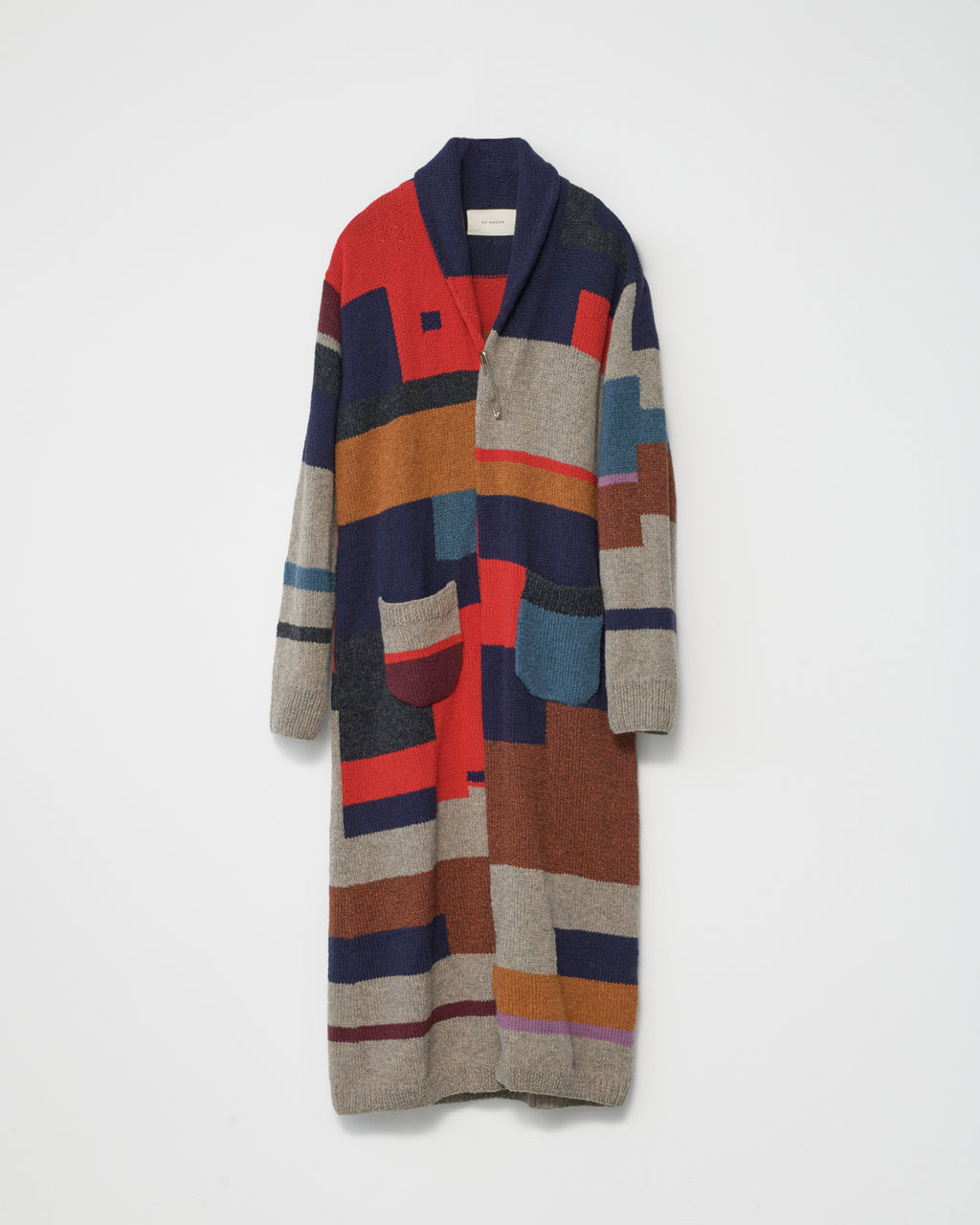 Colorful patterned cardigan on a white background
