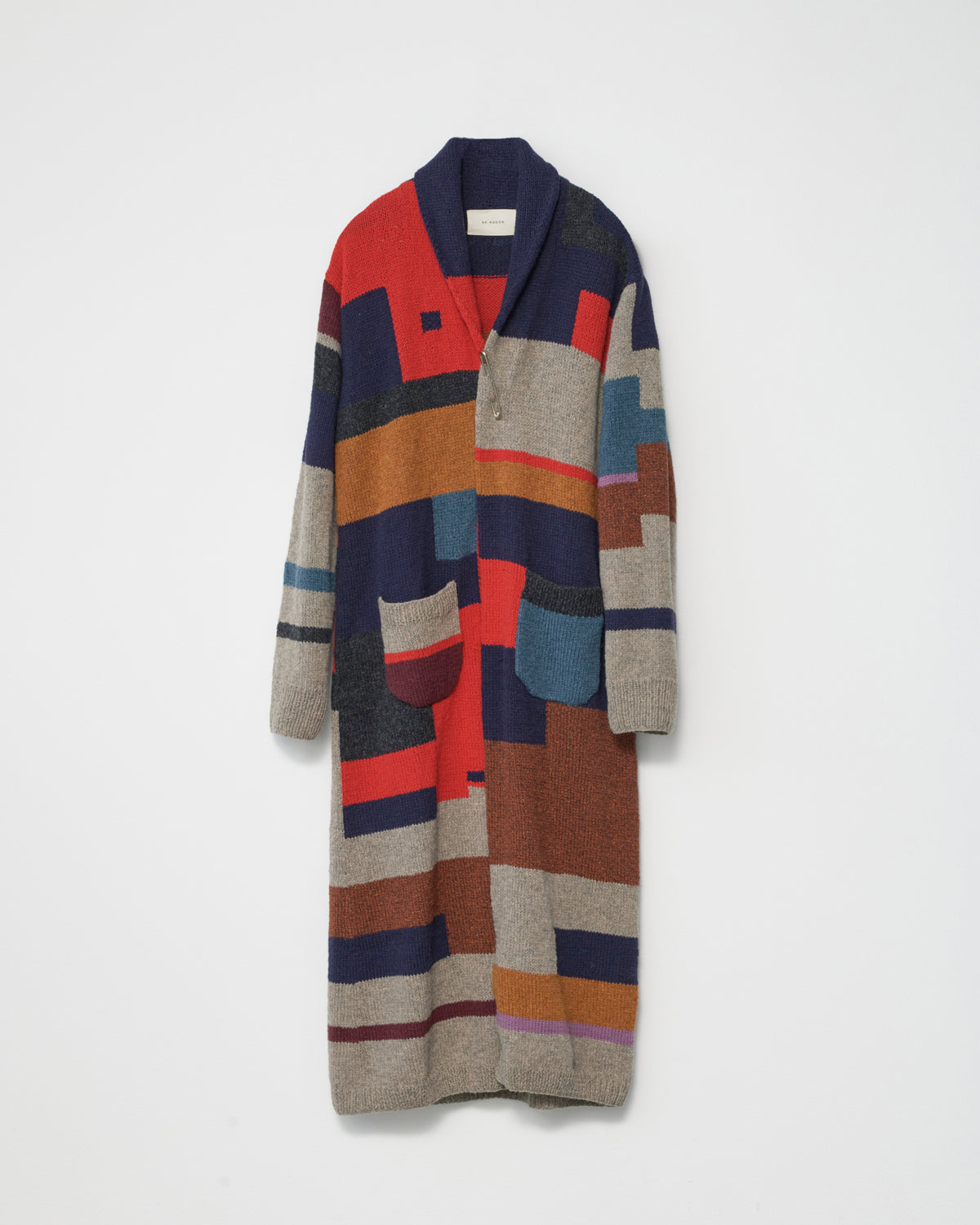 Colorful patterned cardigan on a white background