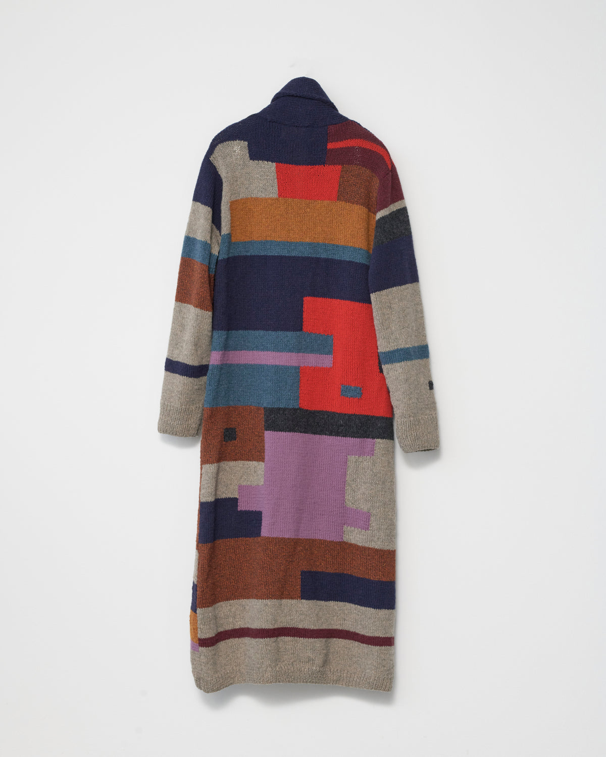 Colorful patterned cardigan on a white background