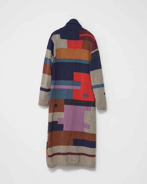 Colorful patterned cardigan on a white background