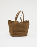 Brown suede tote bag on a white background . Front View