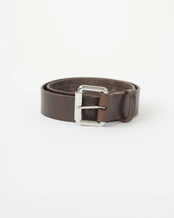 A wide brown leather belt with a metal buckle, displayed against a white background.
